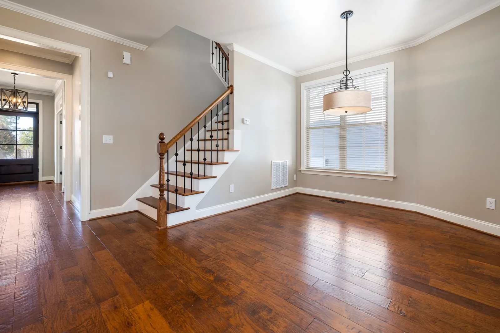 Hardwood entry leading to a staircase in Corona, CA