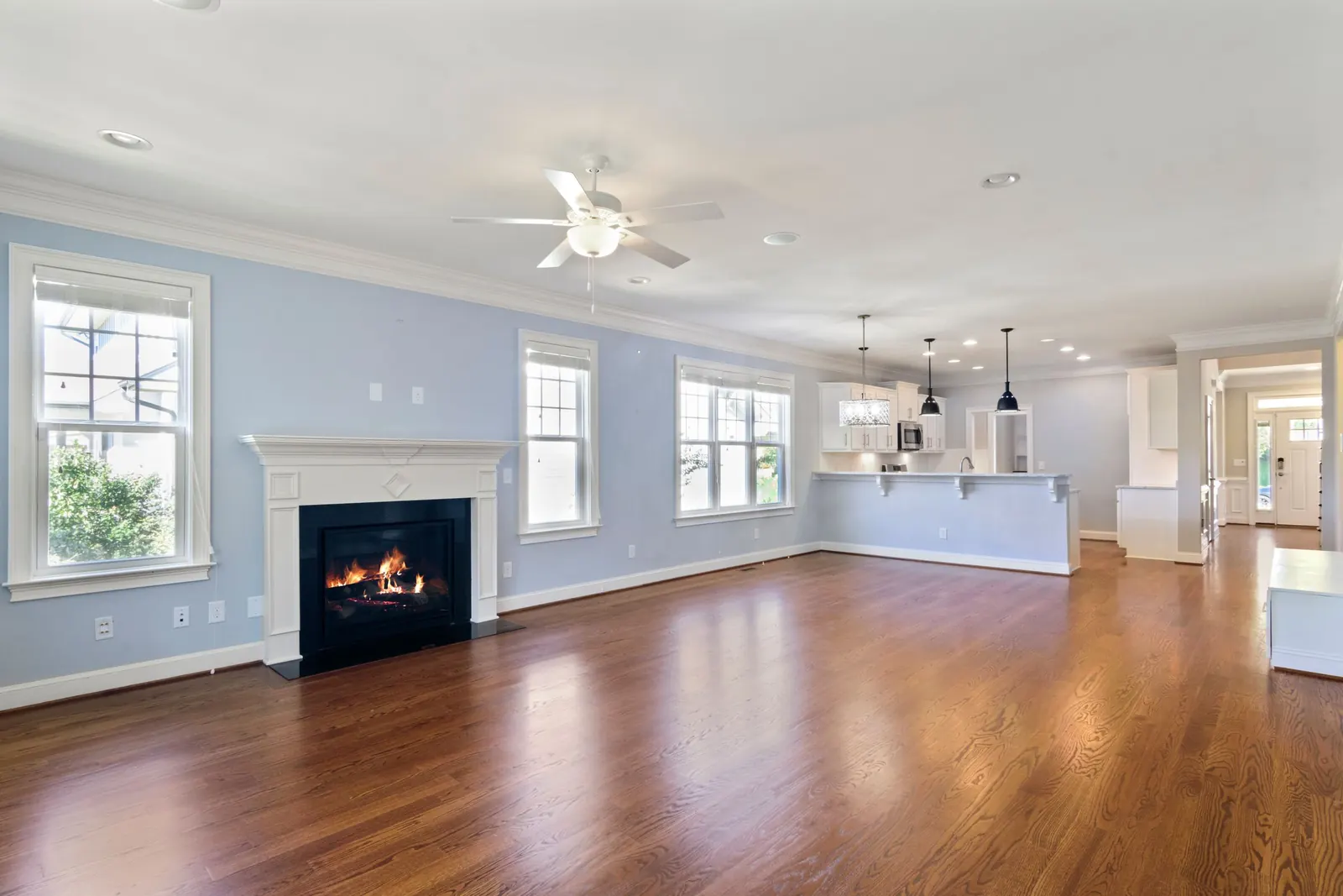 Hardwood living room floor, repaired boards blended in in Riverside, CA