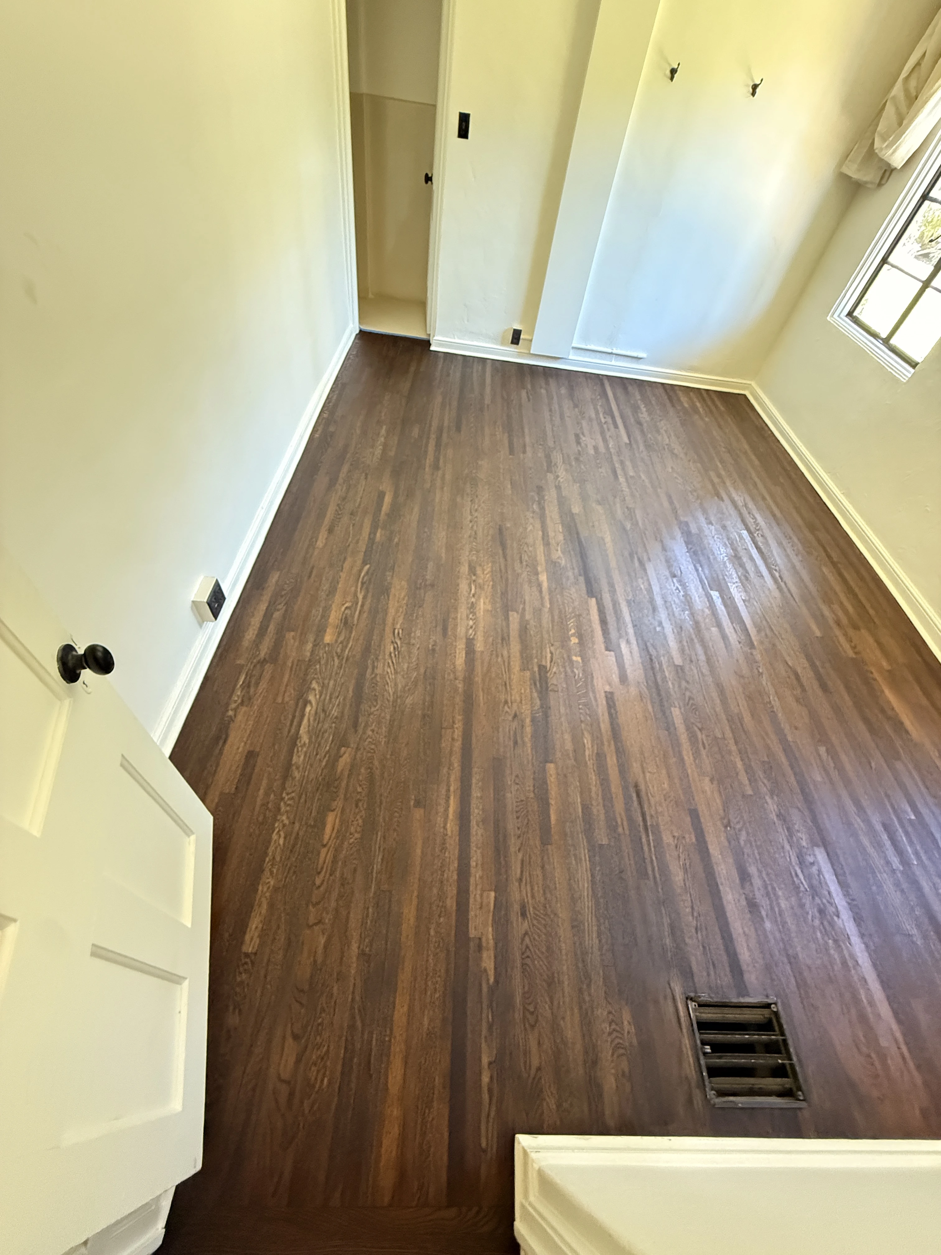 Newly installed wide-plank hardwood floor in an Inland Empire home