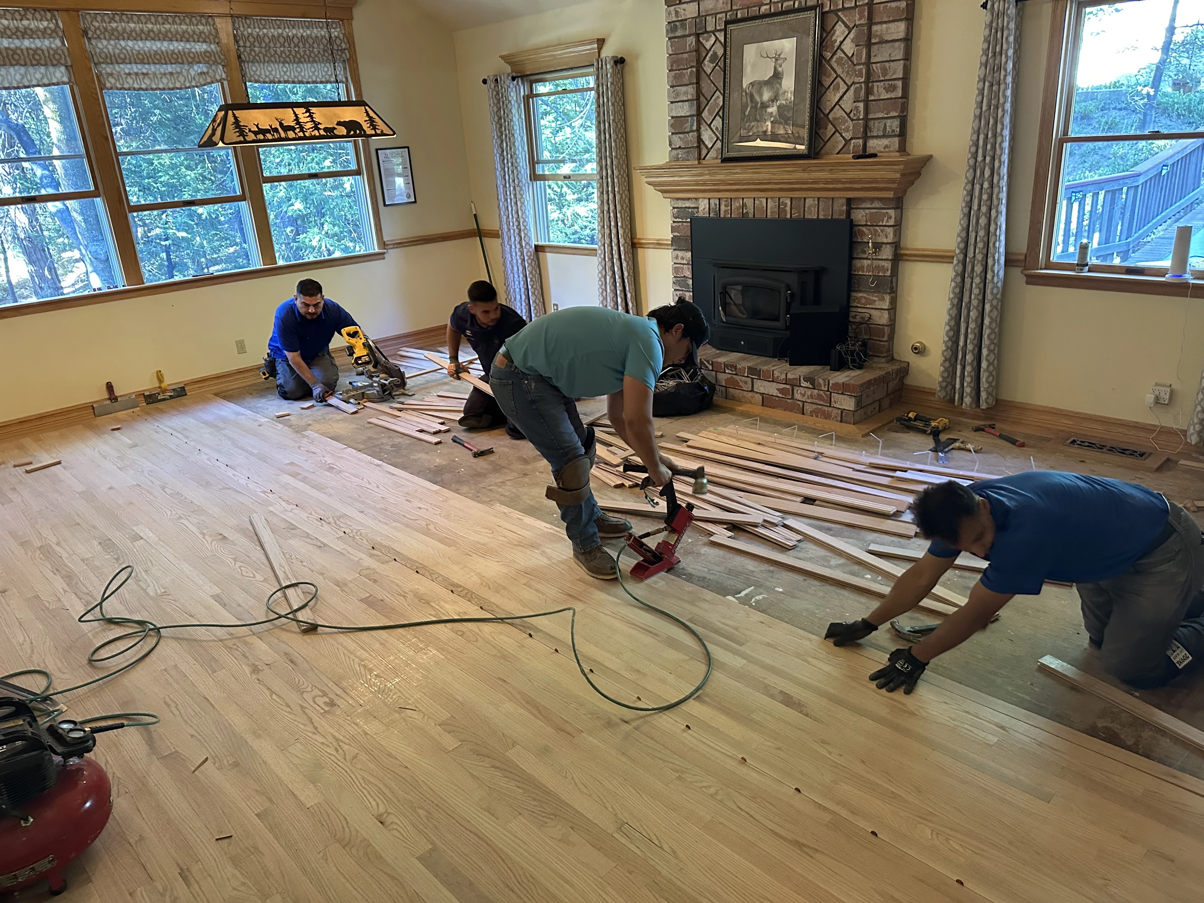Monteros team installing hardwood floors