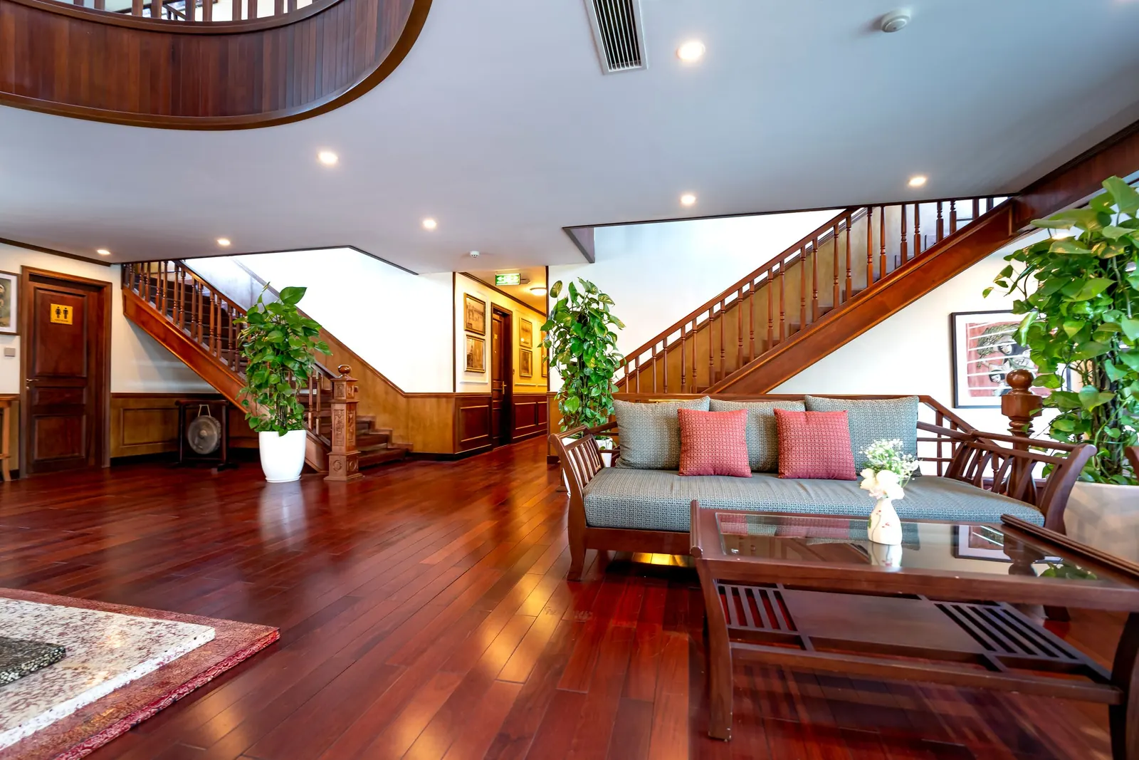 Hardwood staircase in an open foyer in Corona, CA
